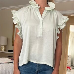 Cream Sleeveless Ruffled Blouse